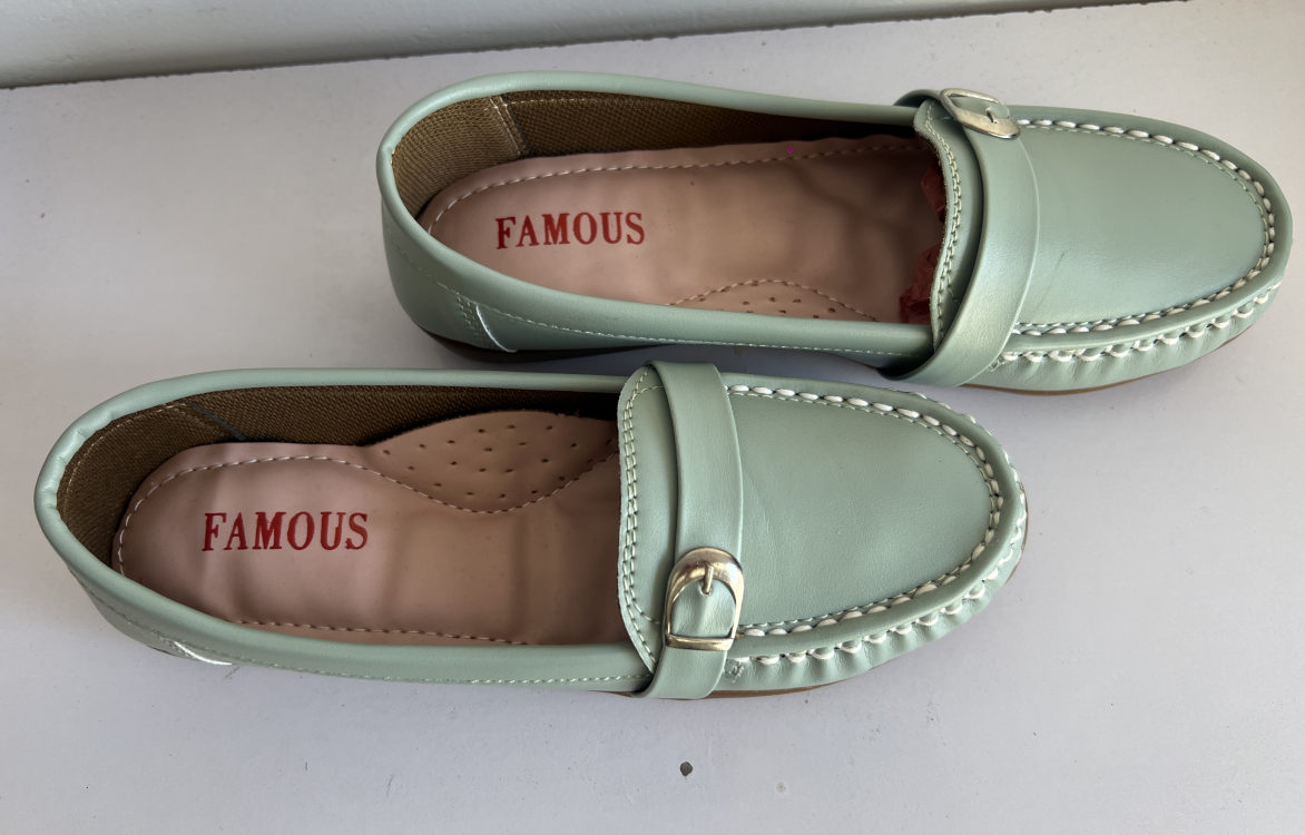 Women’s desaturated green Flats